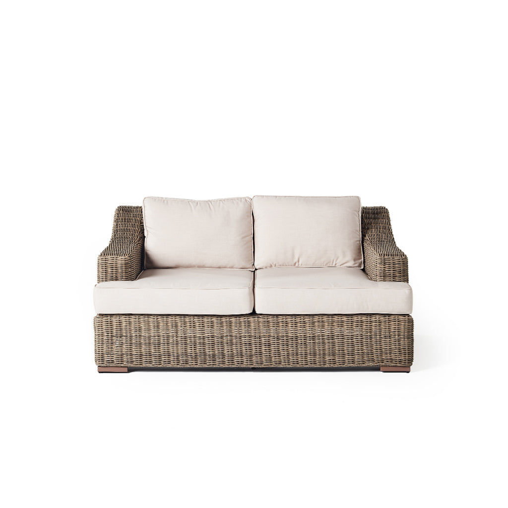 Carmel Wicker Outdoor Loveseat with Natural All-Weather Cushioned Finish